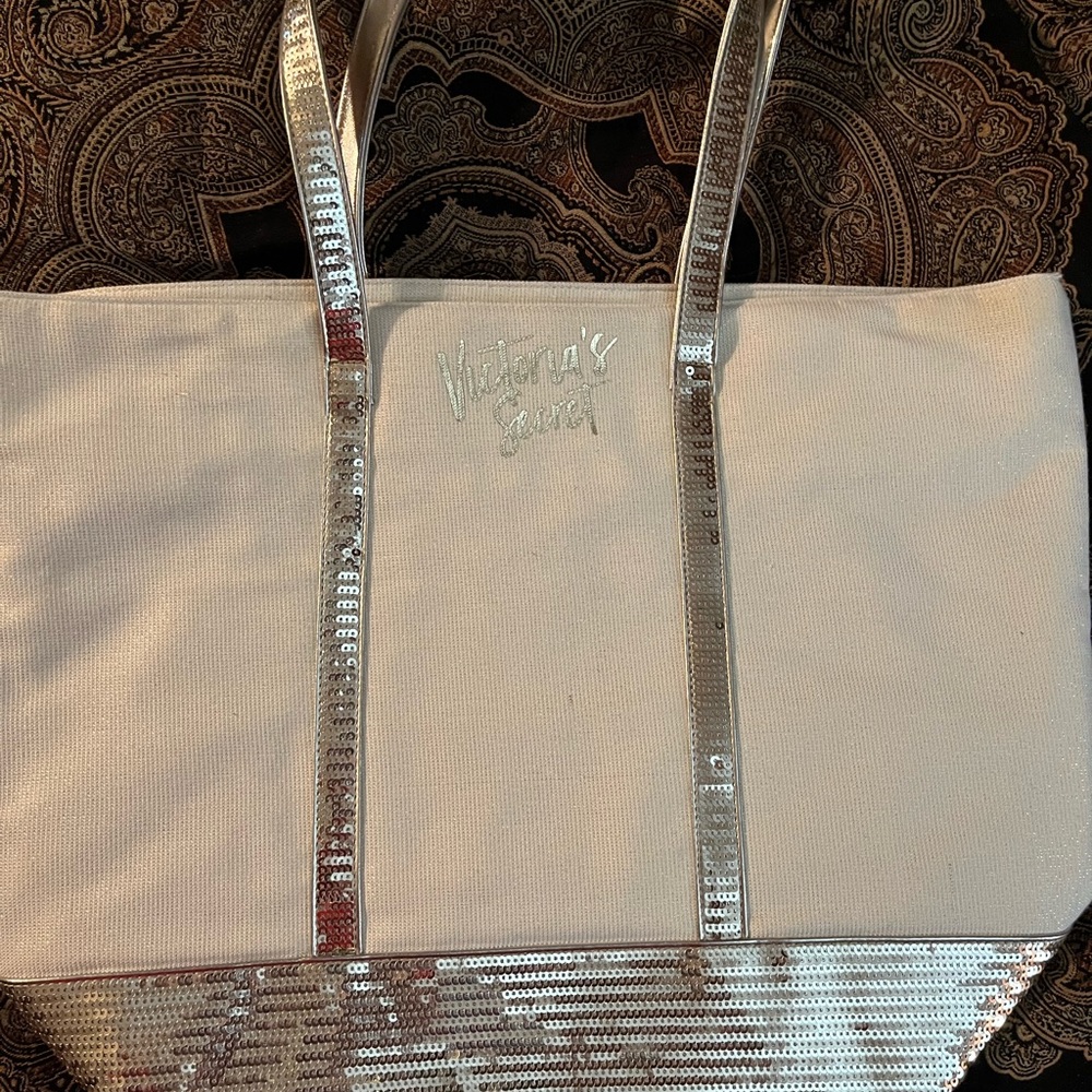 Victoria’s Secret tote.